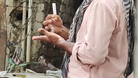This person making own cigarettes