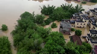 China's Guangdong floods spark extreme weather fears