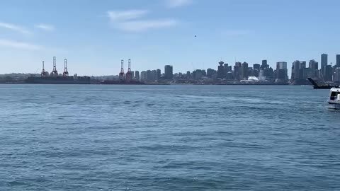 Vancouver seabus leaving North Vancouver and heading to Vancouver gastown