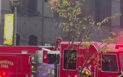 Man crosses wires in Vancouver, falls onto fire truck