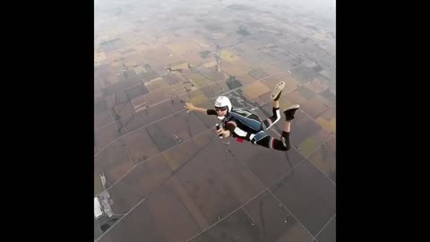 Skydiver Pops out of Box After Being Pushed out of Plane.