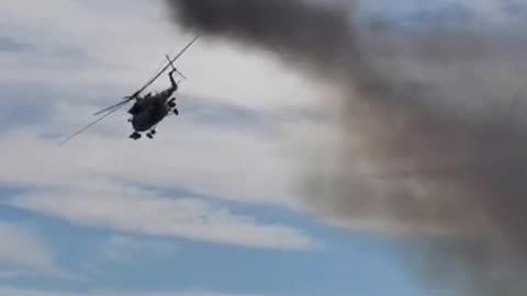 Ukrainian Attack Helicopters Flying Low and Firing Rockets Overhead
