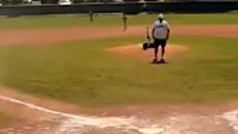 A dust devil strikes during a children's baseball game in Jacksonville