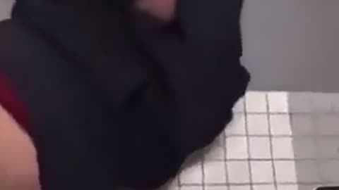 School bully dealt with twice by another student the school bathroom