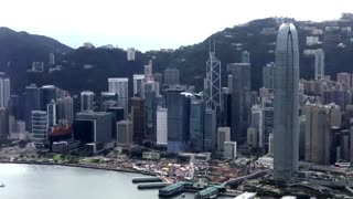 China's homegrown C919 aircraft flies over Hong Kong