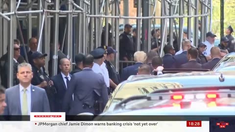 Donald Trump arrives at New York court to be placed under arrest