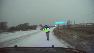 Police Officer Jumps Out Of The Way Of Out-Of-Control Vehicle
