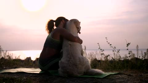 Woman relaxing with her dog