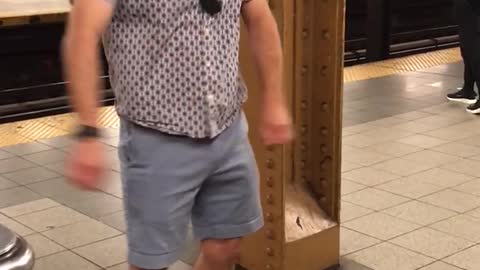 Guy mustache fedora floss dance subway