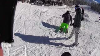 Lime green pants ski faceplant