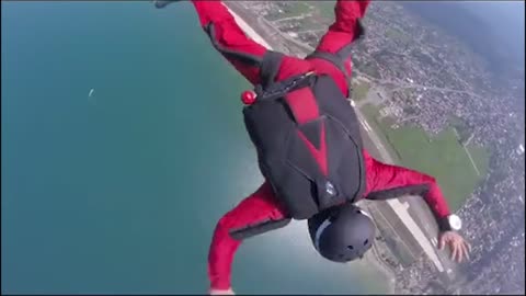 Skydiving Instructor Rescues Student Unable to Pull Parachute