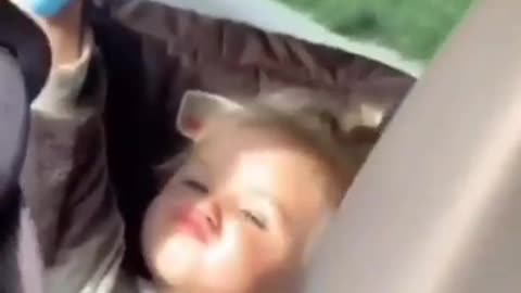 Funny reaction of a cute kid when he sees the camera