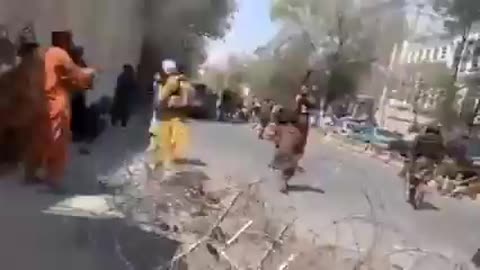 Taliban members arresting protesters, reporters in Kabul, Afghanistan