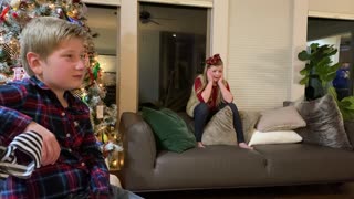 Family Surprises Kids with Puppy for Christmas