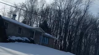 Shoveling Snow Off the Roof