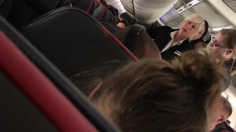 Laptop Sent Flying in Airplane Altercation