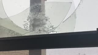 Playfully Thrown Snowball Ends with Broken Window