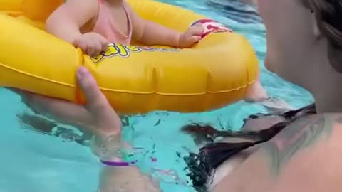 Cute baby in swimming pool