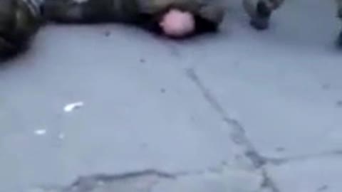 Russian POW's Shot in the Leg by Ukrainian Nationalists