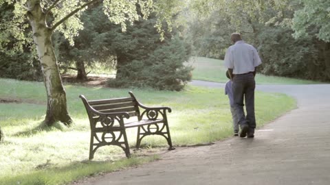 An Old Man Taking A kid For Walk