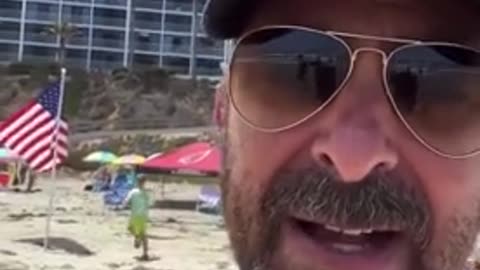 Leftist Freaks Out Seeing American Flags On Beach
