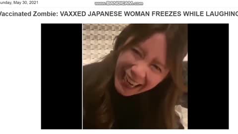 JAPANESE WOMAN FREEZES IN MIDDLE OF LAUGH