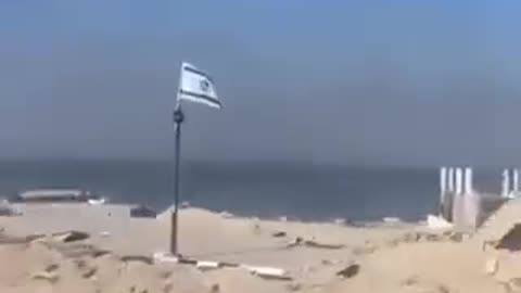 Israeli flags along one of the military routes in Gaza