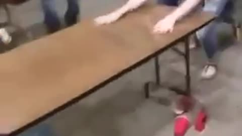 Teen Girl Belly Flops On Unstable Folding Table