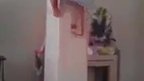 child climbing pillar without safety accessories