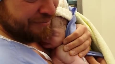 Dad meets his boy for the first time. 💙 😍