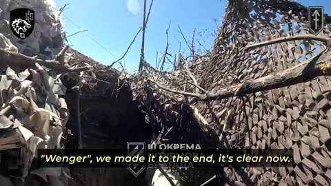 Ukrainian soldiers clearing a Russian position in Kharkiv Oblast
