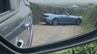 Car Does 15-Point-Turn on Country Lane