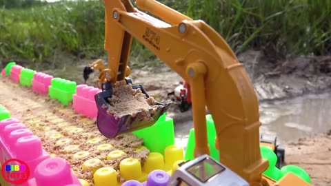 Building bridge Colored Blocks and Sand with Truck, Excavator, Road Roller