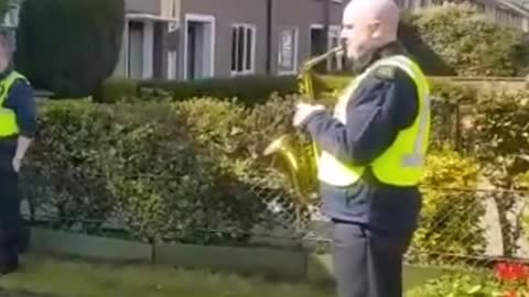 100-year-old woman dances to police officer playing the saxophone for her birthday | GMA