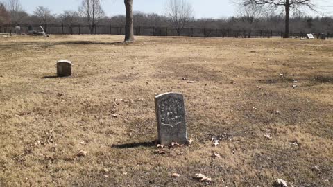 Historic cemetery in the midwest tall oak trees