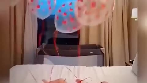 Baby enjoying Balloons