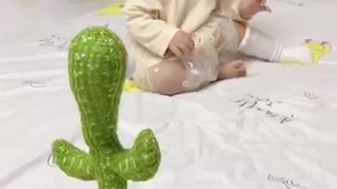 Funny baby get scared seeing dancing cactus - #shorts #youtubeshorts #funnybaby