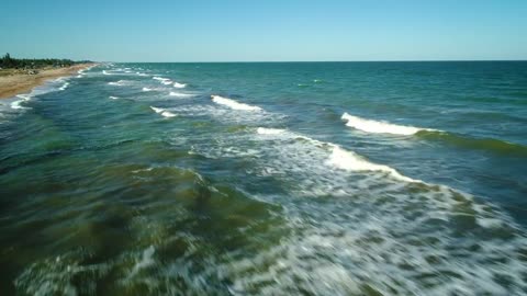 Fast travel over the water of a beach