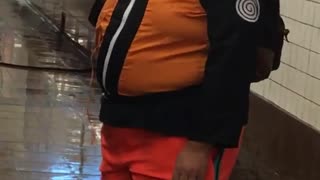 Guy dressed as naruto orange costume