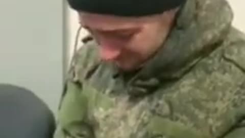 Captured Russian soldier with tears in his eyes being allowed to call his mother in #Russia