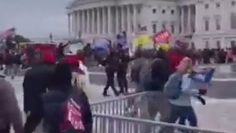 Cops 3rd Angle Open Fence and Waving In Protesters U. S. Capitol Building