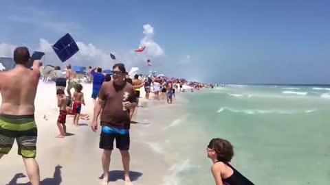 flying tents in the beach