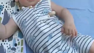 Adorable baby looks at his mama!