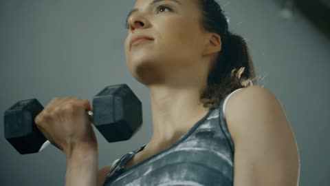 Woman Lifting Weights