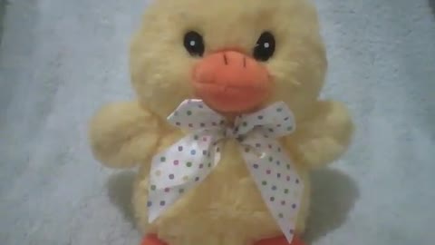 Cute yellow stuffed chick with white bow painted with colorful polka dots [Nature & Animals]