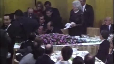 George W Bush vomits at the japanese prime minister
