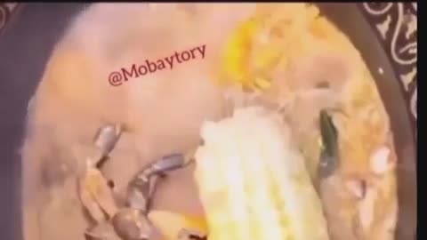 This crab is cook alive and is enjoy some corn