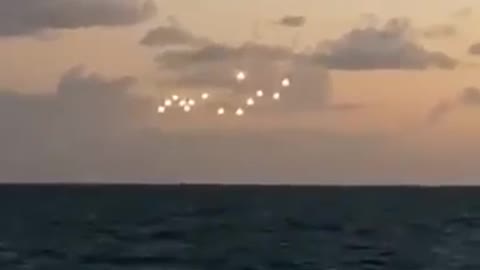 MIDDLE OF THE OCEAN FLEET OF UFOs ANGELS CHARIOTS OF GOD HOVER ILLUMINATED BRIGHTLY🕎 Isaiah 13:3