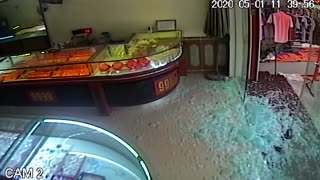 Boy Shatters Glass Door in Shop