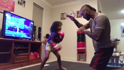 5-year-old girl trains with dad to become boxer